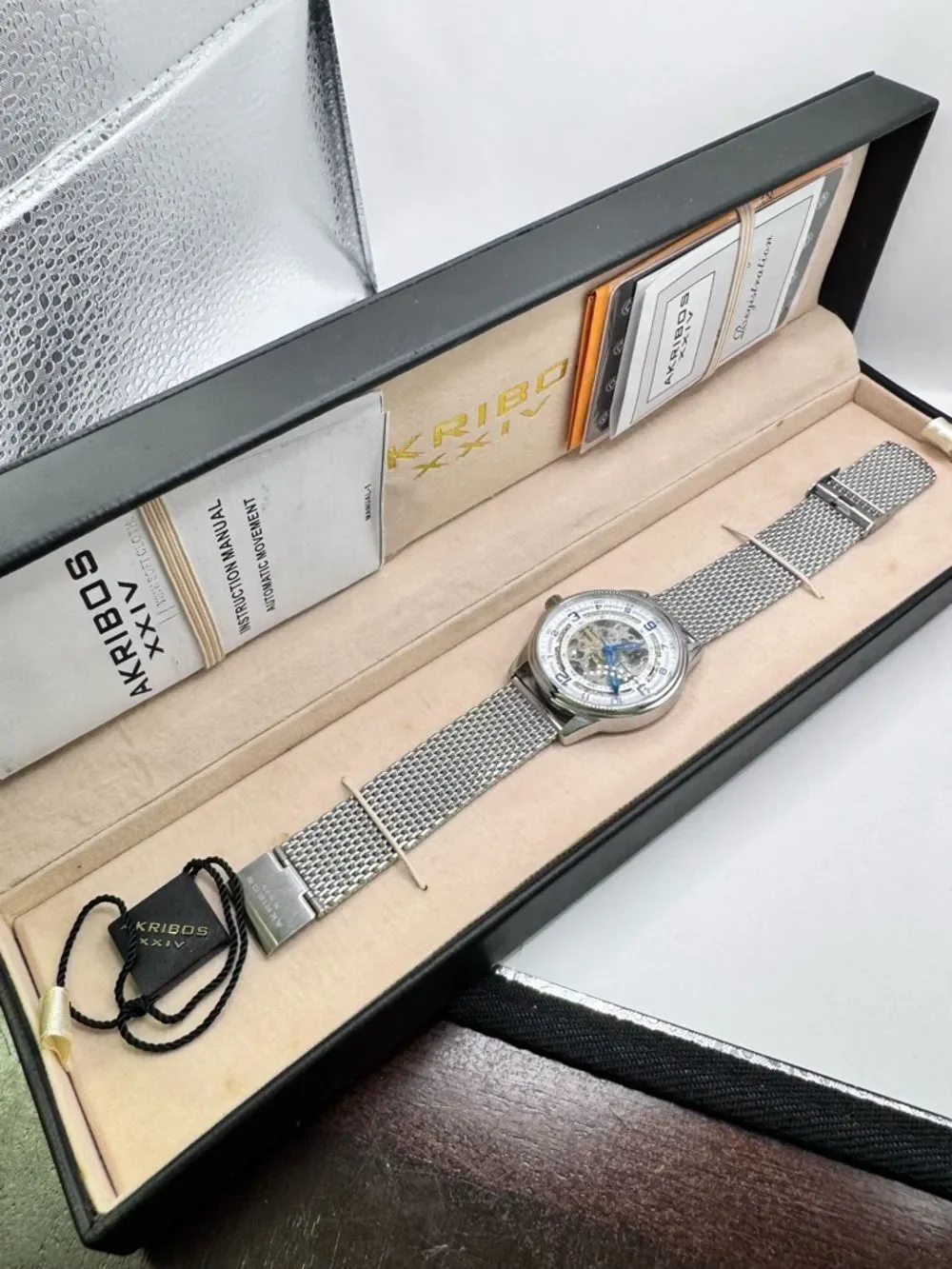 Akribos XXIV Men's Automatic Skeleton Watch Blue Hands Mesh Band New in Box
